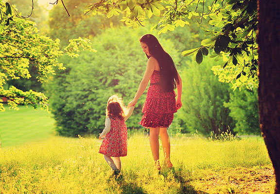 mother-walking-with-a-child-in-the-woods